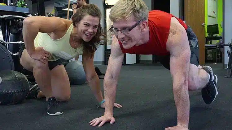 Shape Plus personal trainers in Denver coaching a client