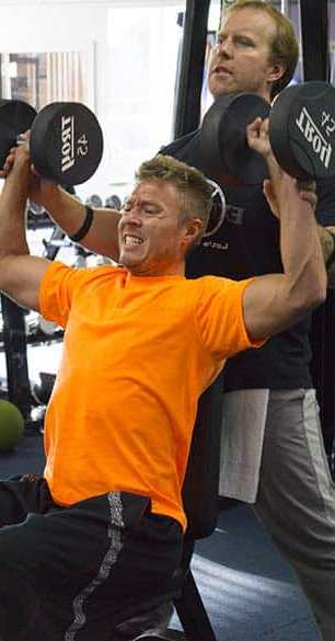 Shape Plus trainer coaching a customized personal training workout.
