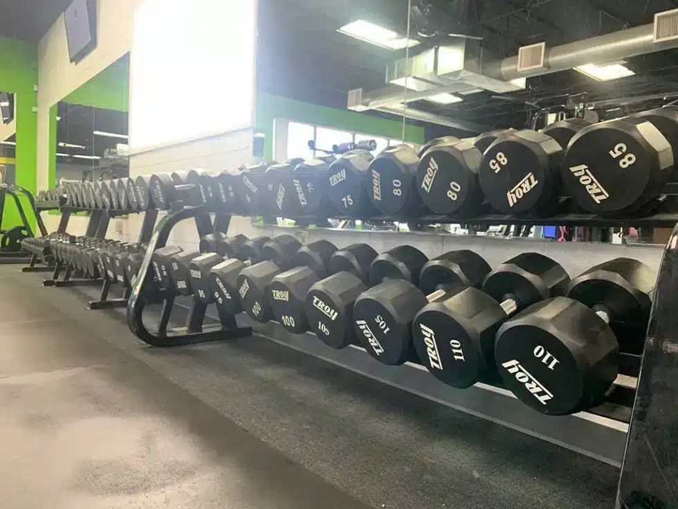 Full dumbbell racks inside the Shape Plus Denver personal training gym